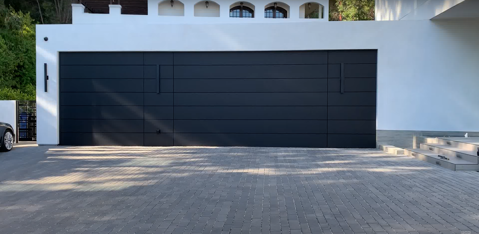 Custom garage door with a modern design installed in a residential home in Arcadia, Florida