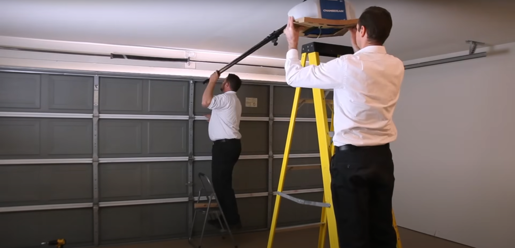 Garage door opener installation service in Arcadia, Florida, showcasing a technician installing a modern garage door opener with precision tools