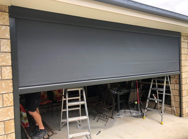 Technician performing same-day garage door repair in Arcadia, Florida, ensuring fast and reliable service.