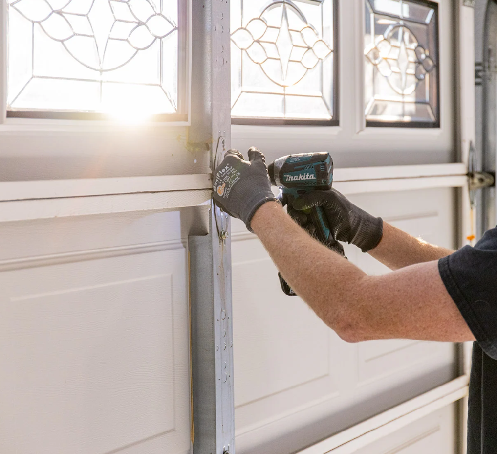 Professional garage door installation service in Arcadia, Florida, featuring a newly installed modern garage door on a residential property.