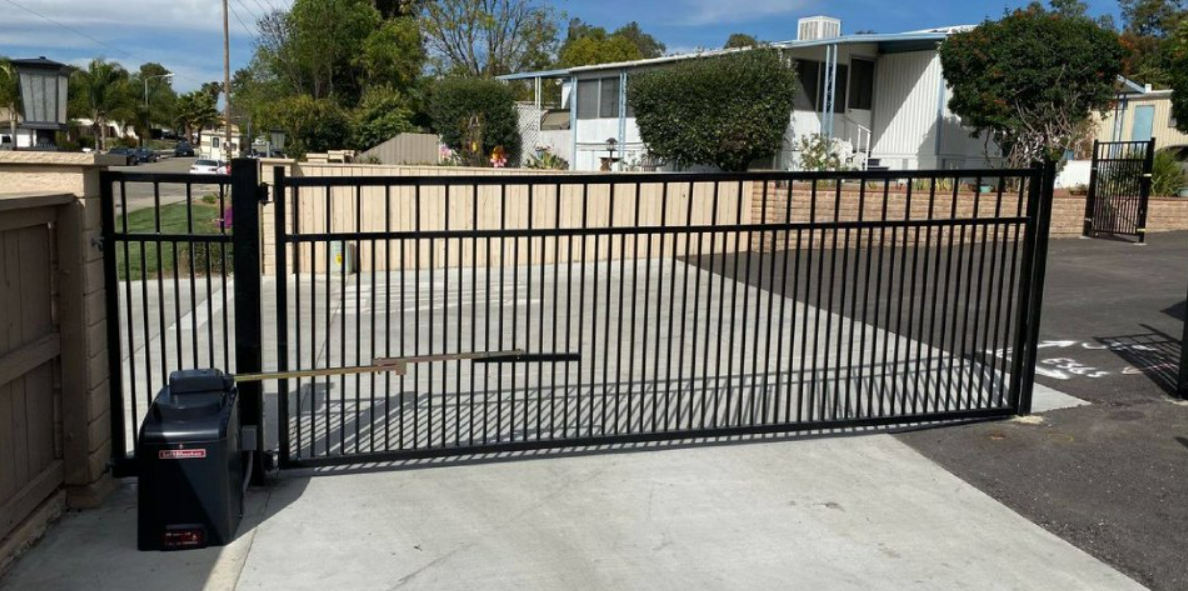 Technician performing commercial gate repair in Arcadia, Florida for enhanced functionality and security.