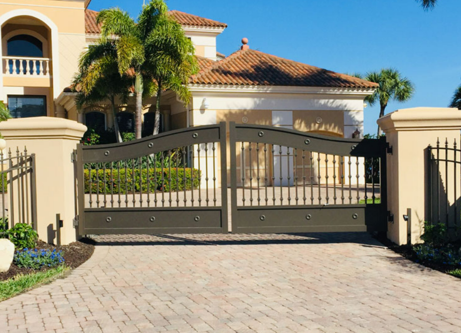 Technician performing residential gate repair in Arcadia, Florida, ensuring smooth operation and security.