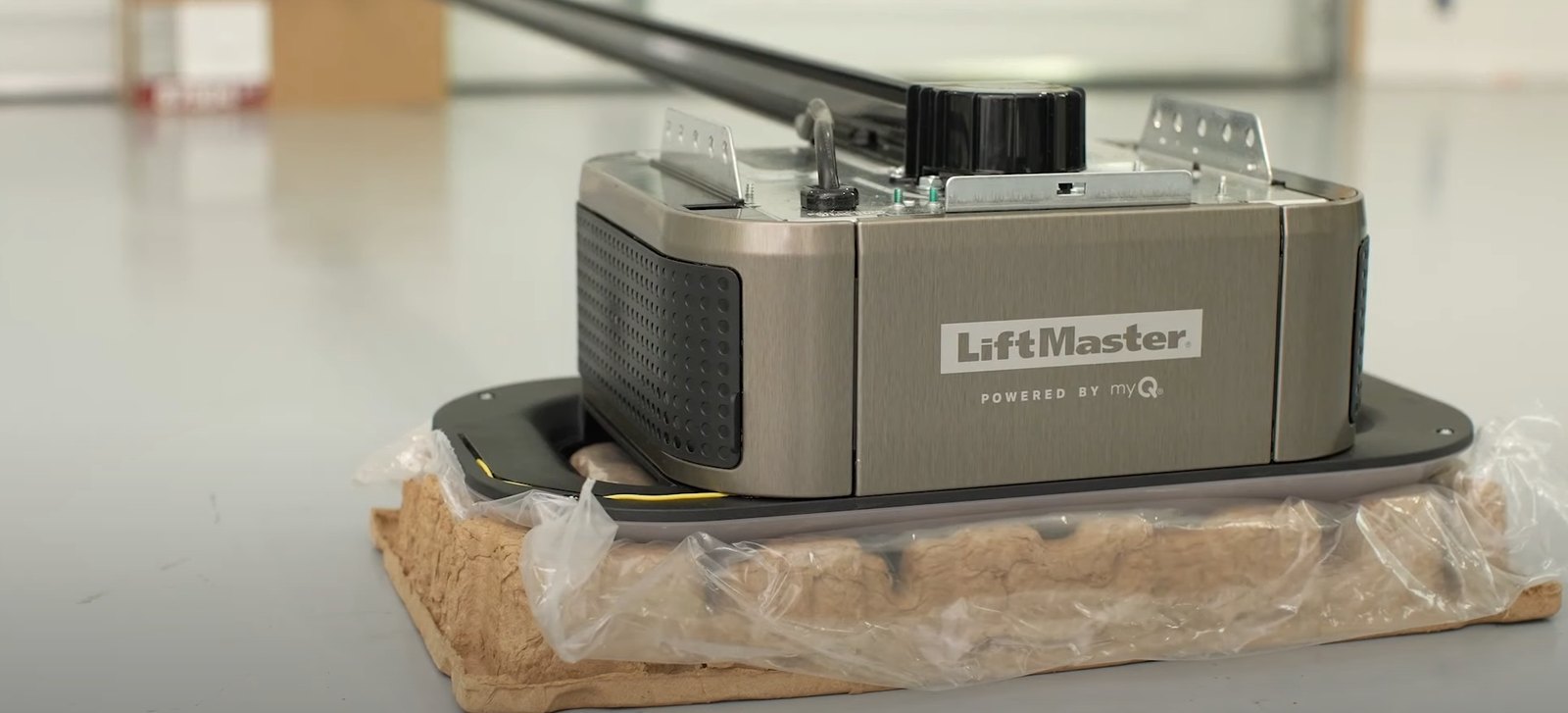 Technician performing garage door opener installation in Arcadia, Florida